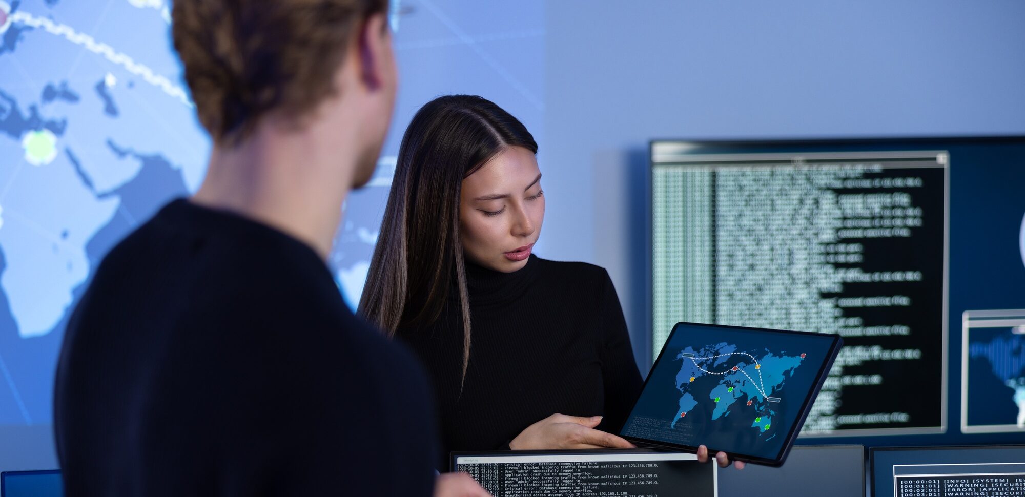 Cyber security team working in a Cyber Security Operations Center SOC to protect systems and
