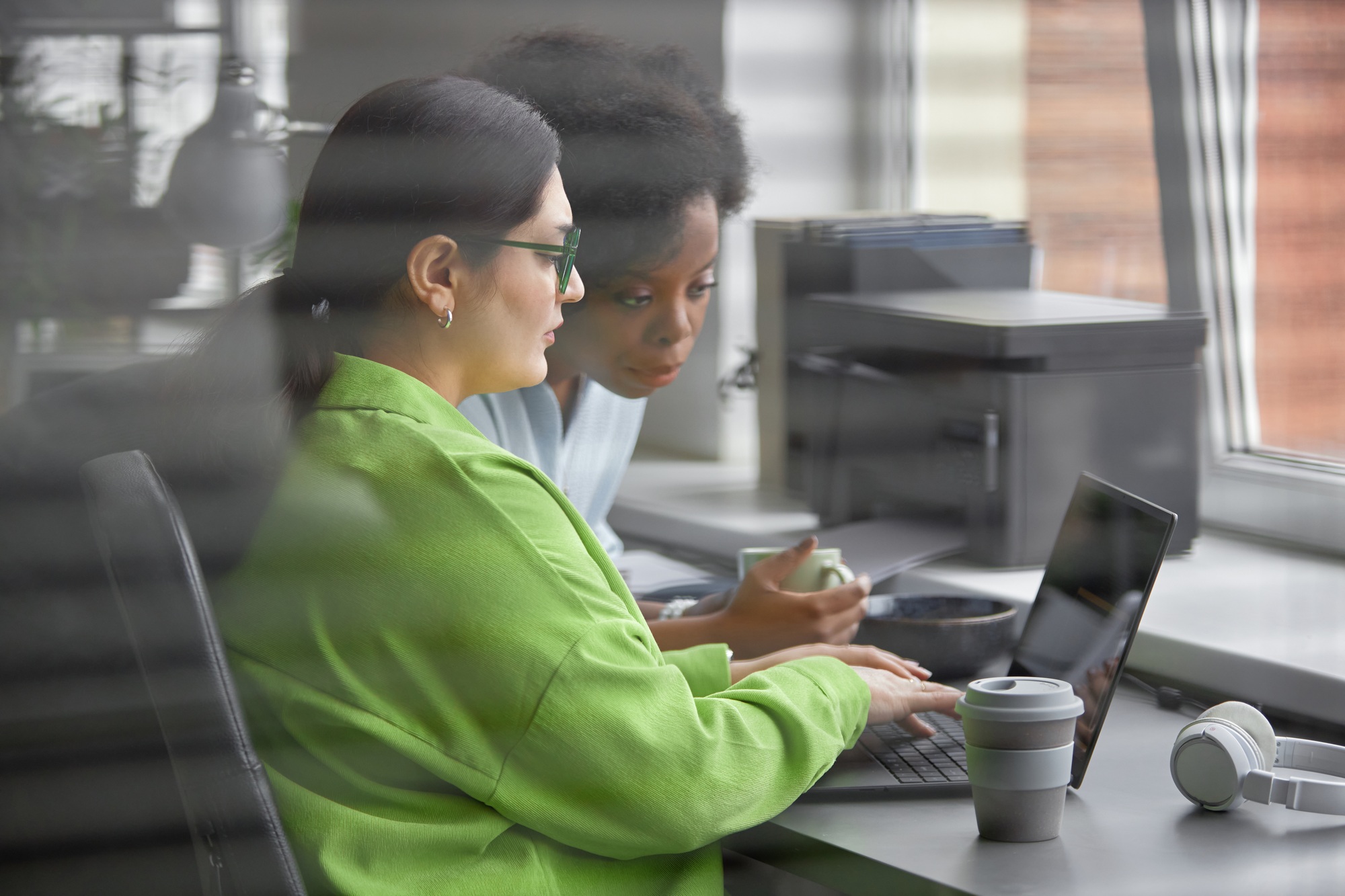 Plus Size Programmers Reading Computer Screen Debugging Code
