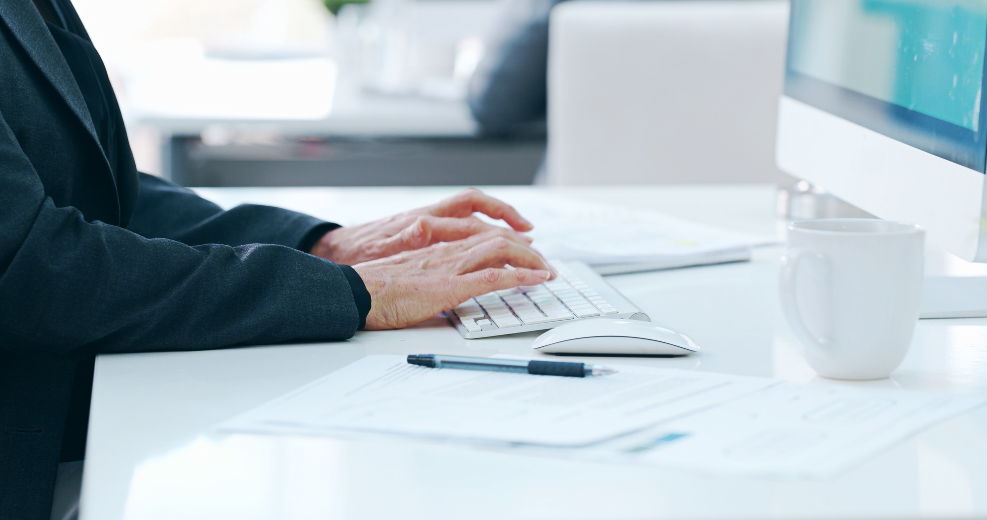 Typing, hands and computer for copywriting, office and creative for press release, planning and dig